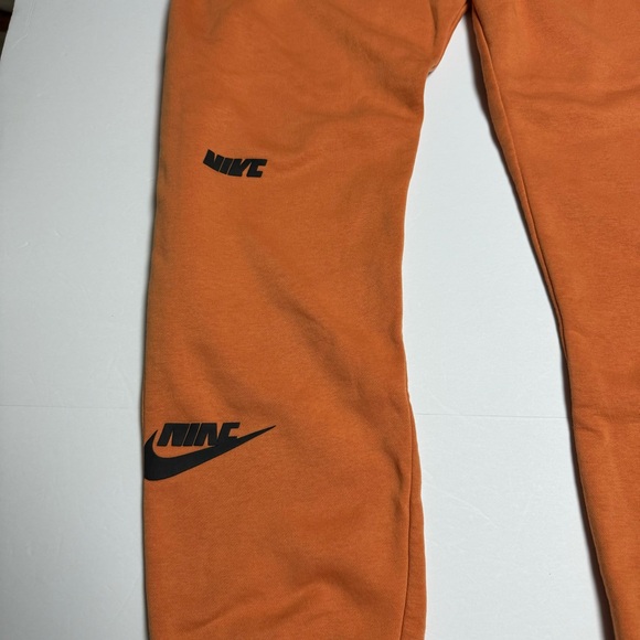 Nike Sportswear Essentials Fleece Pants In Hot Curry/Habanero Size: Large - Picture 11 of 16